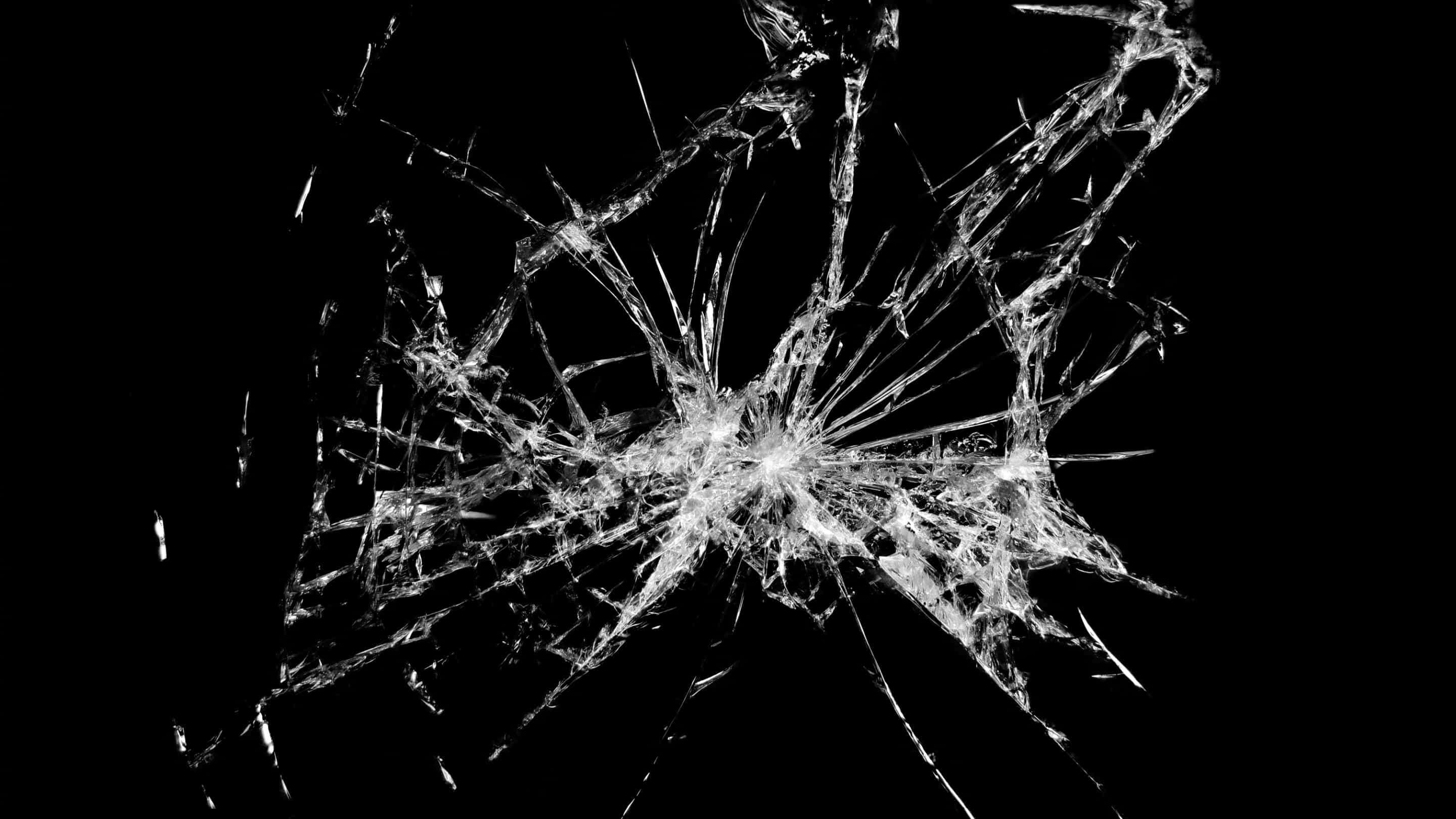 Resistencia al impacto del vidrio - Normen Glass Shock Resistance un vidrio roto con muchas grietas