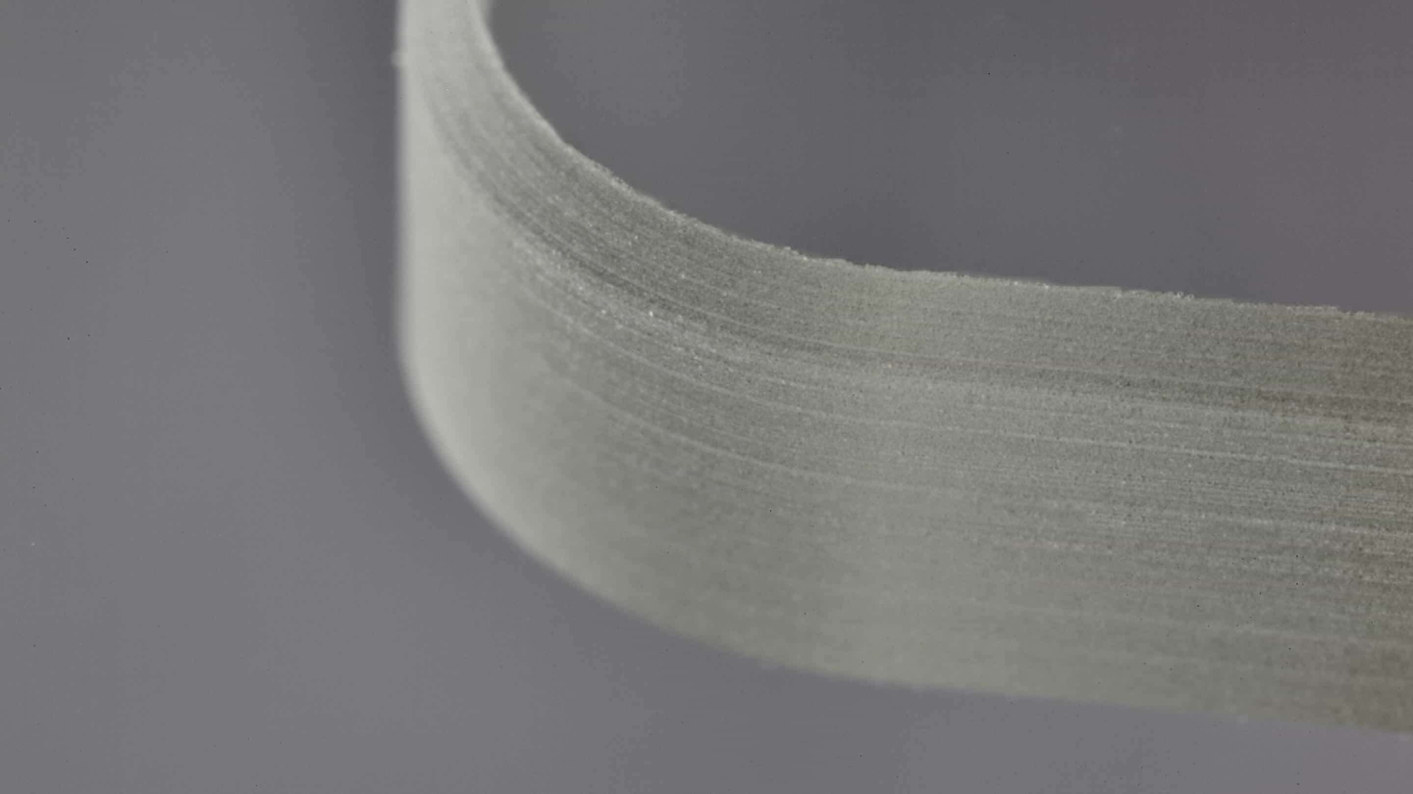Impactinator® Glass - Cut glass edge a close-up of a tape