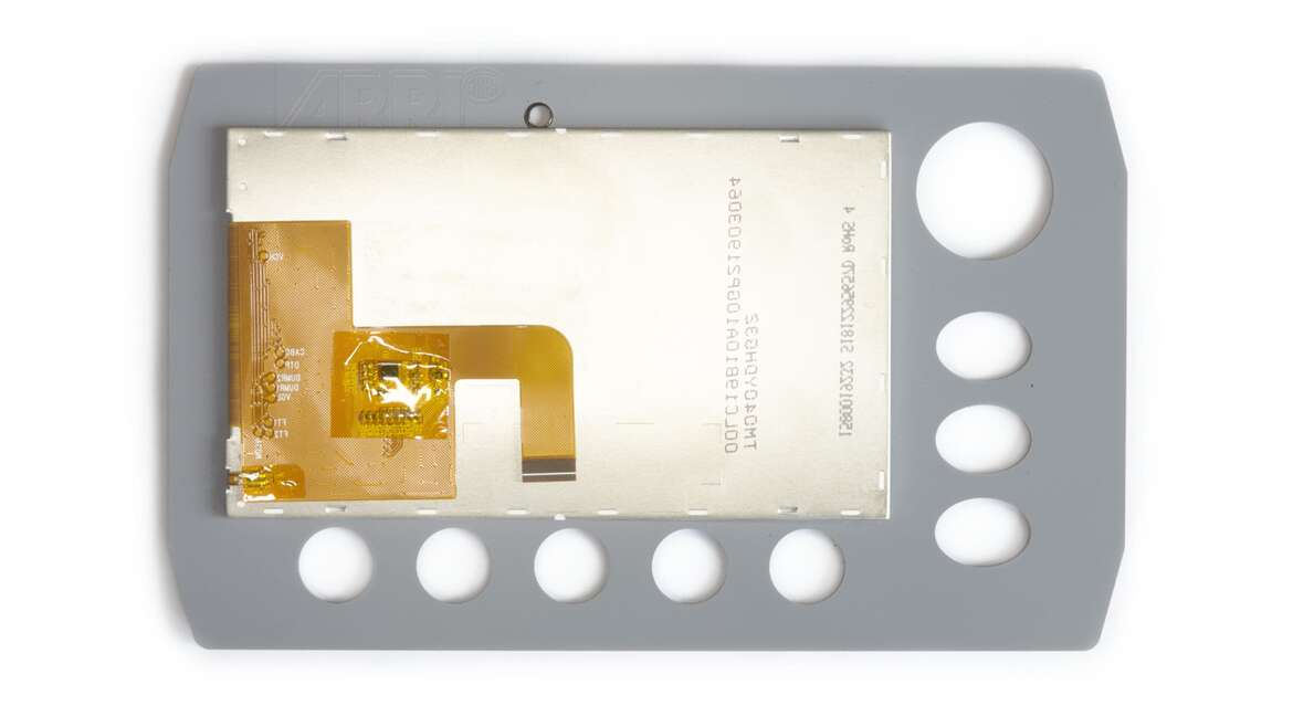 Optinen liimaus - optinen liimaus: harmaa suorakaiteen muotoinen laite, jossa on kulta- ja hopealevy